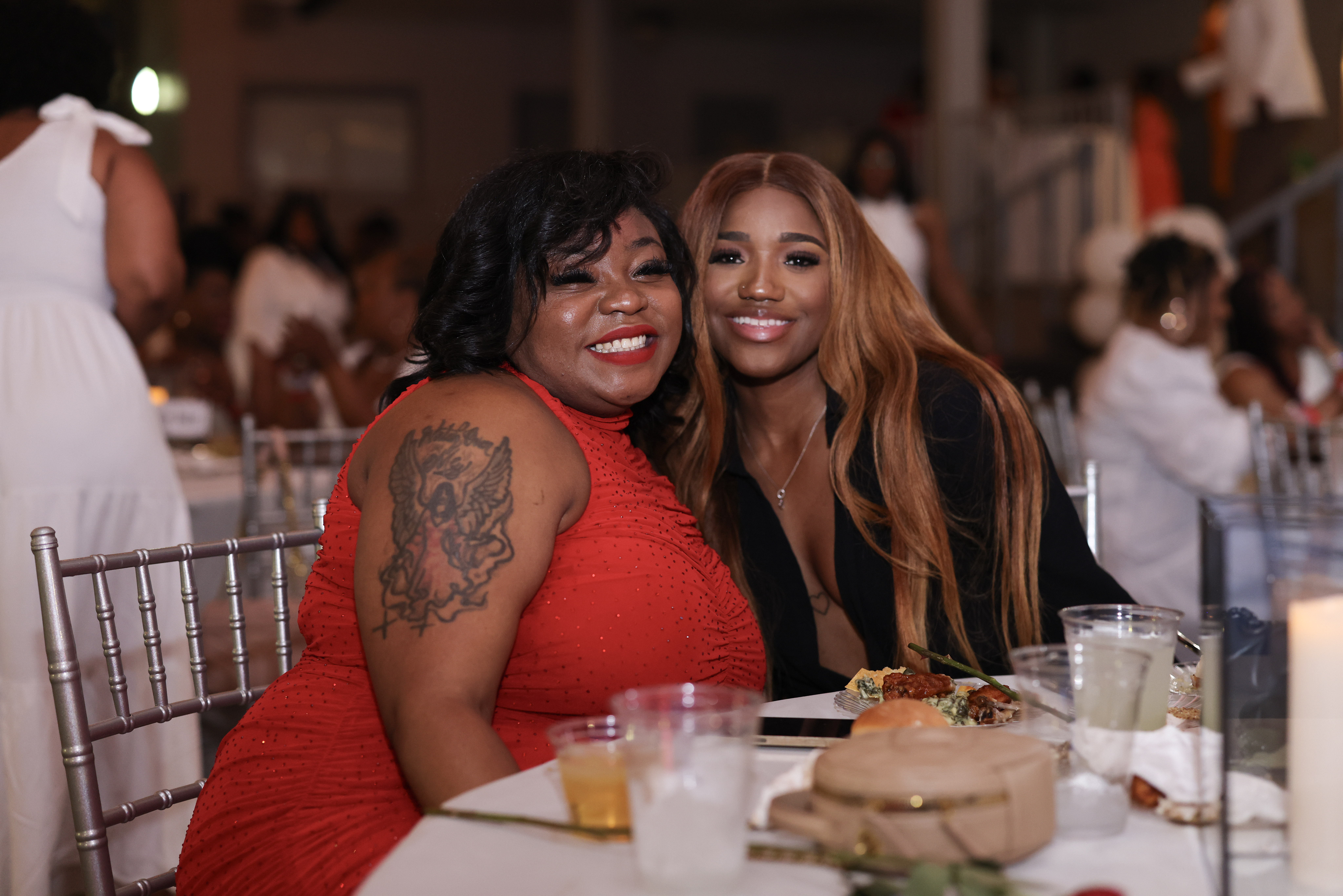 Spring Kreme guests sharing a joyful candid moment